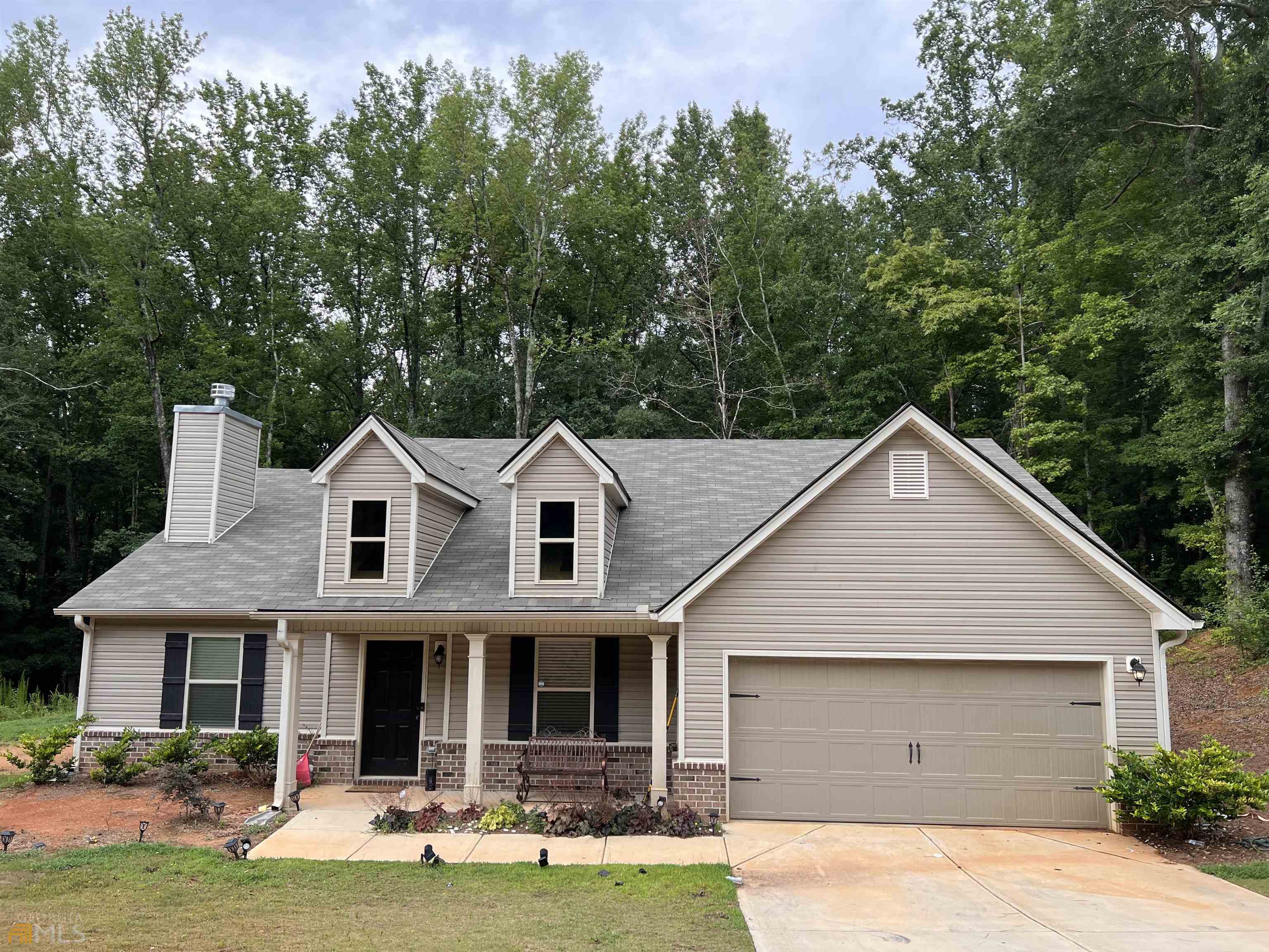 230 Paul Smith Road Hull, GA 30646 - Photo 1 of 1 a front view of a house with garden