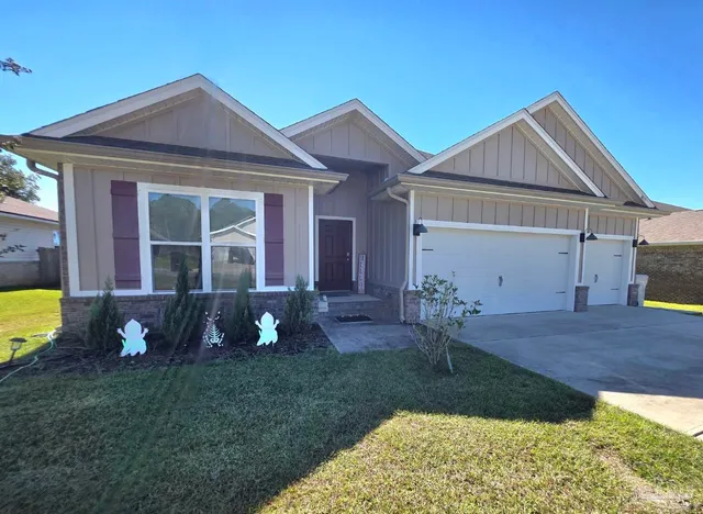 a house view with a garden space