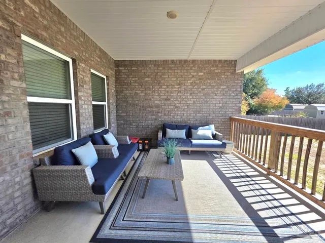 a view of sitting area with furniture