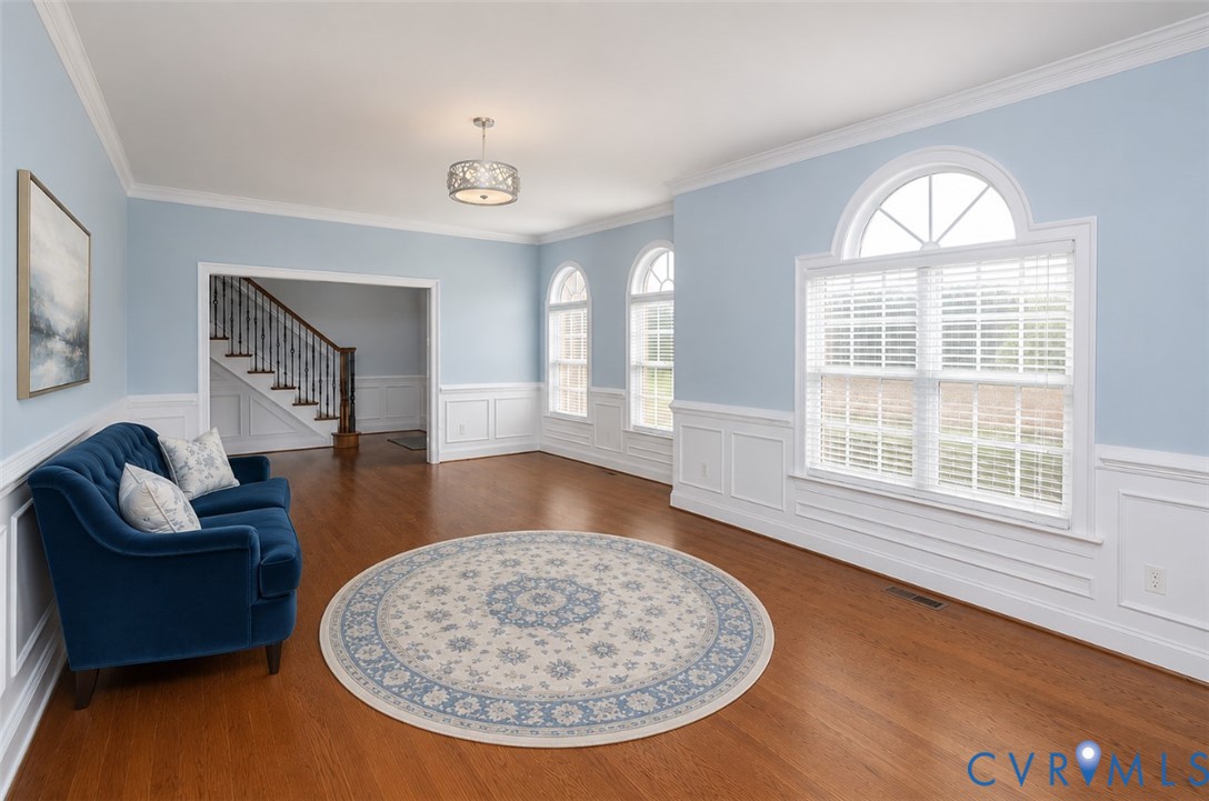 239 Jennings Road Cartersville, VA 23027 - Photo 12 of 26 Bright room featuring hardwood flooring, white wai