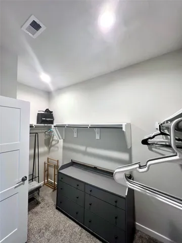 a utility room with washer and dryer