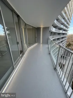 a view of an empty room with stairs