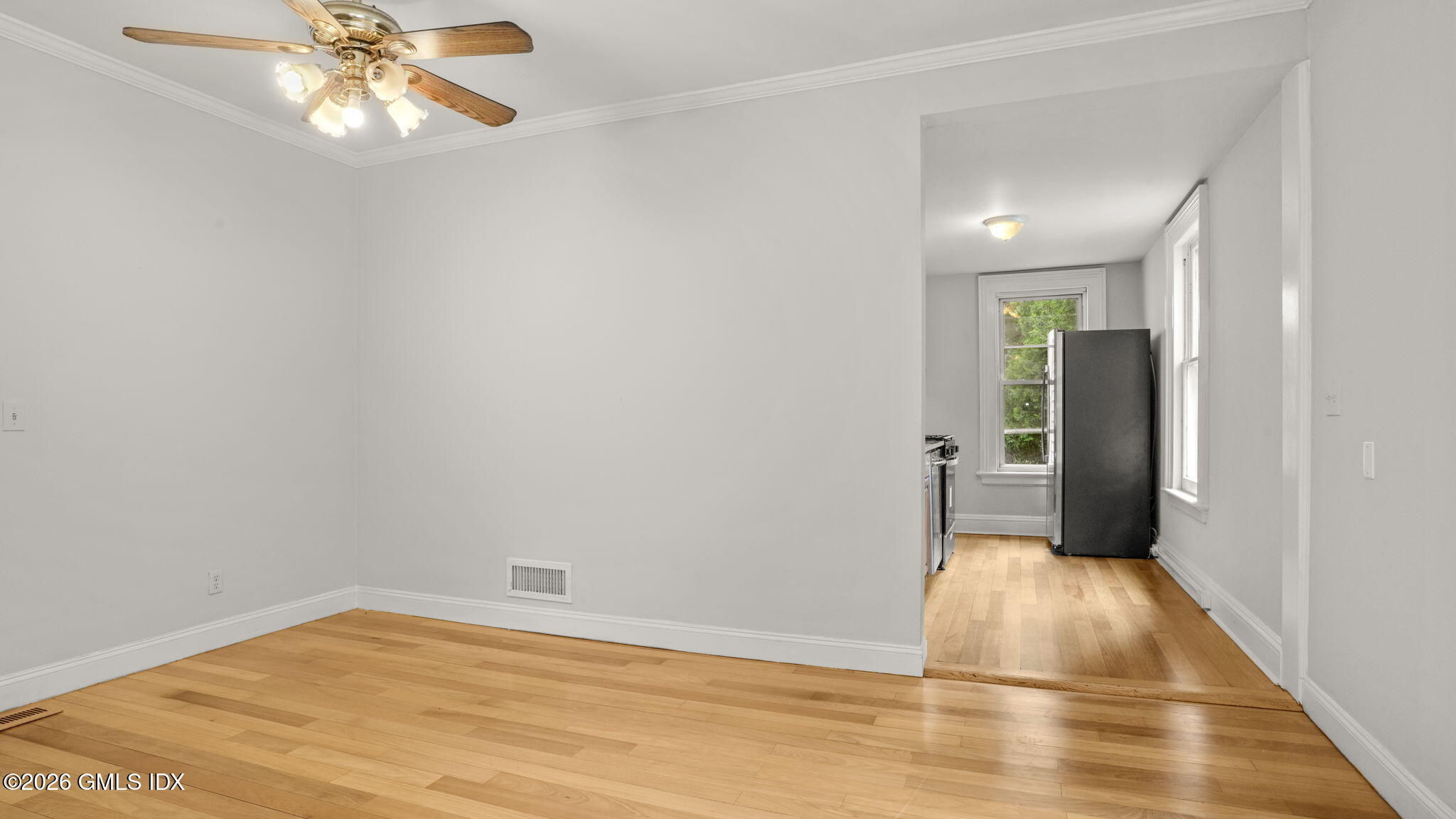 43 Church Street, Unit 1 Greenwich, CT 06830 - Photo 9 of 17 a view of an empty room and window