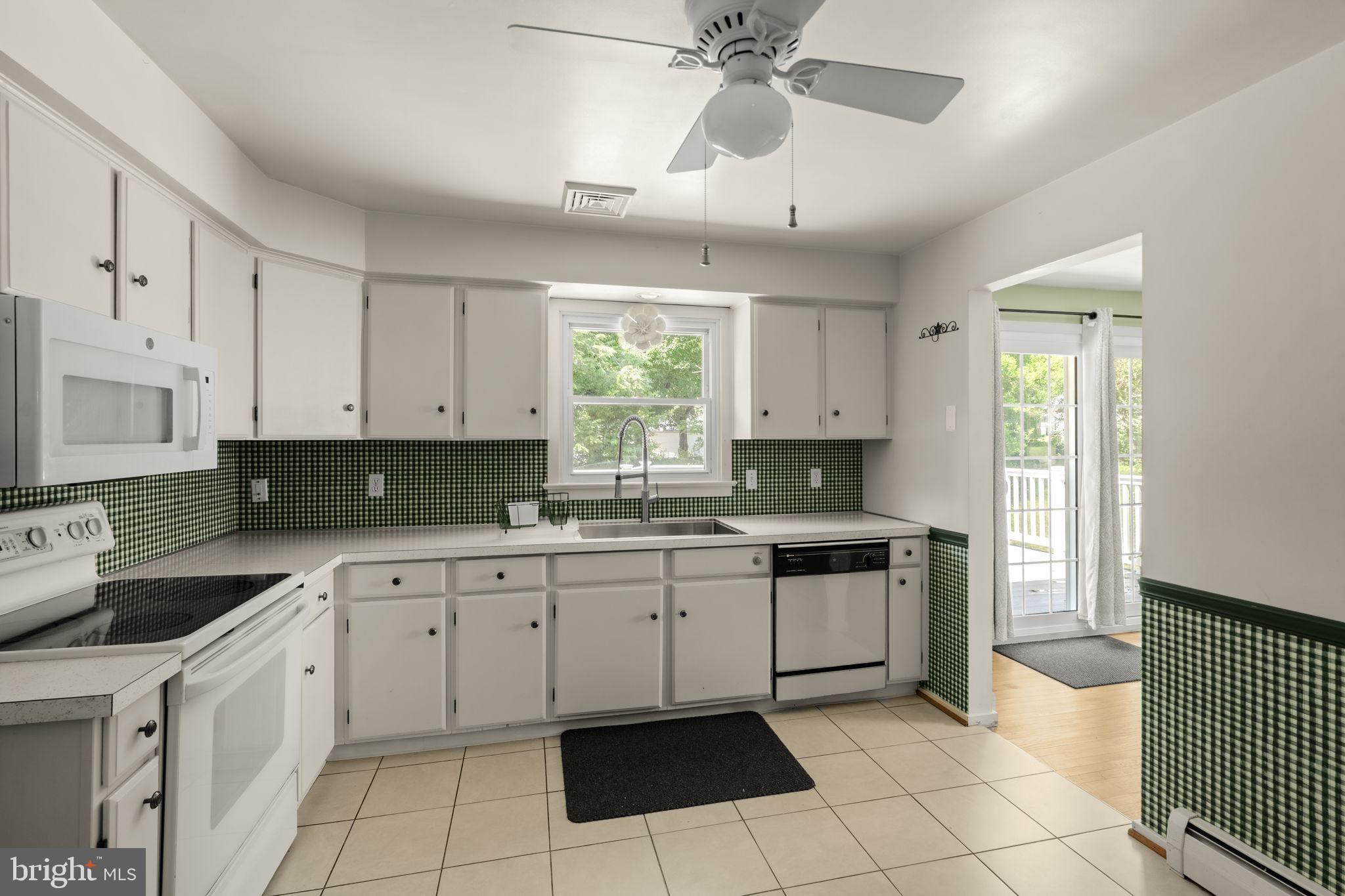 4107 Trowbridge Road York, PA 17402 - Photo 10 of 50 Charming kitchen with green accents.