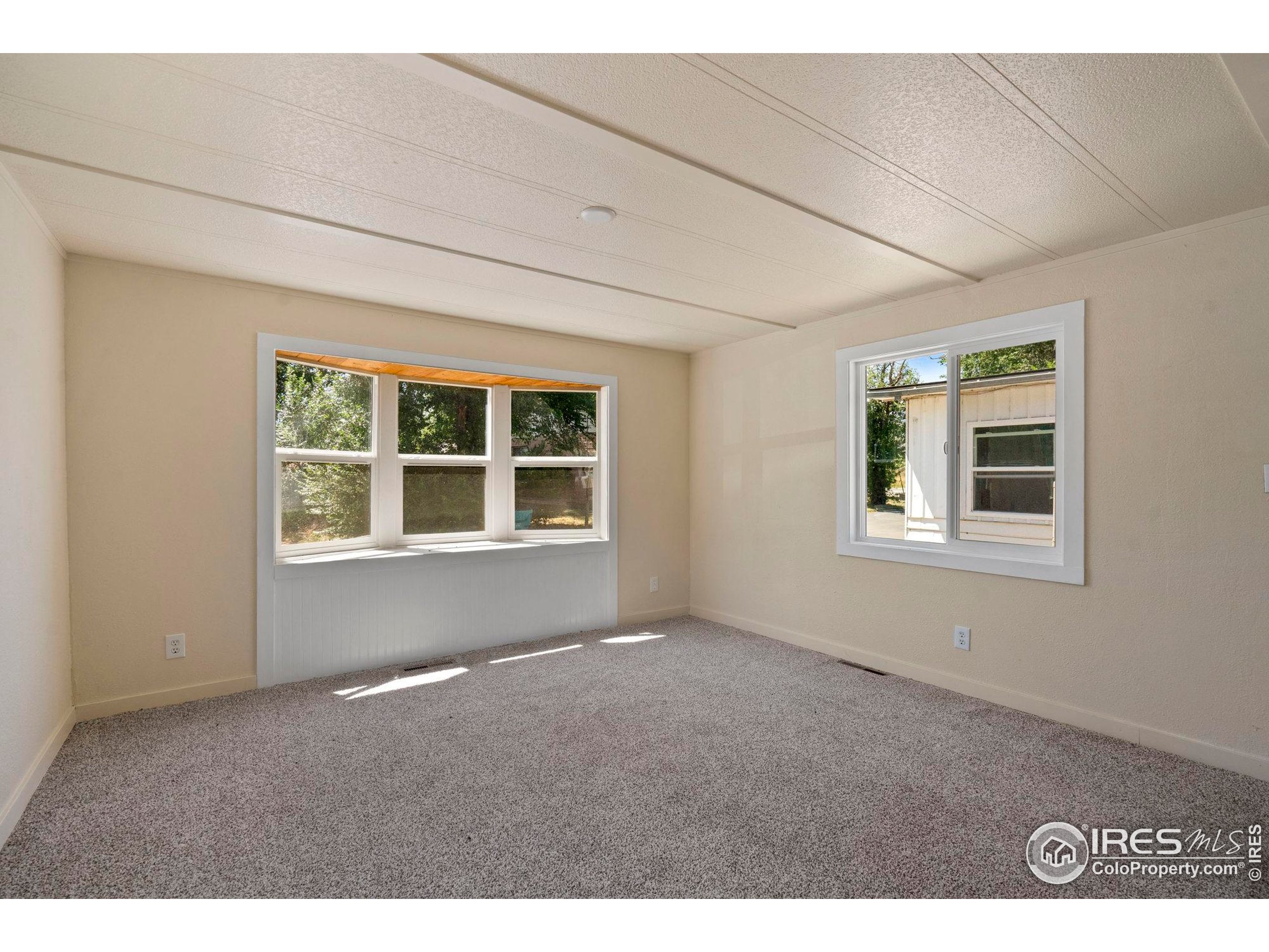 400 South Overland Trail, Unit 6 Fort Collins, CO 80521 - Photo 15 of 21 a view of an empty room with a window