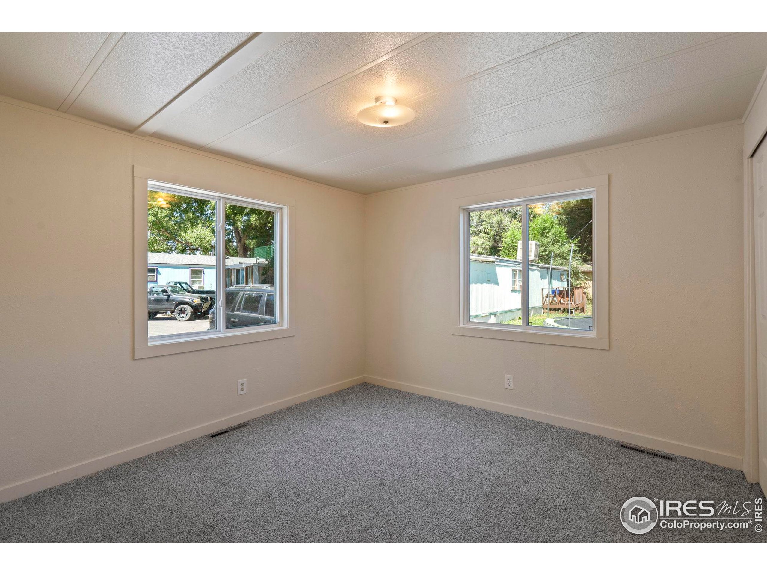 400 South Overland Trail, Unit 6 Fort Collins, CO 80521 - Photo 20 of 21 a view of an empty room with a window