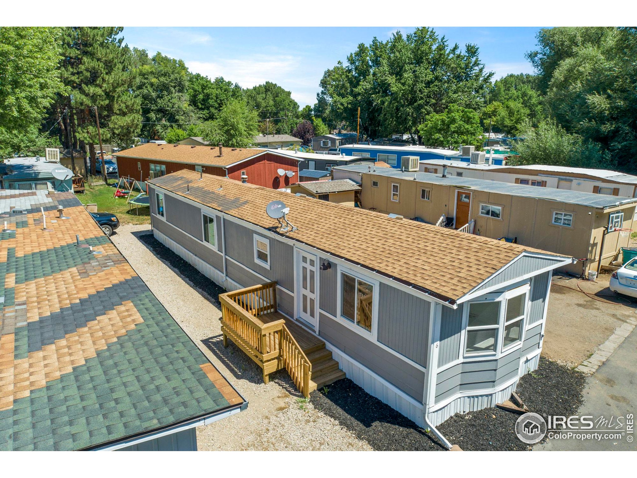 400 South Overland Trail, Unit 6 Fort Collins, CO 80521 - Photo 2 of 21 an aerial view of a house with a backyard