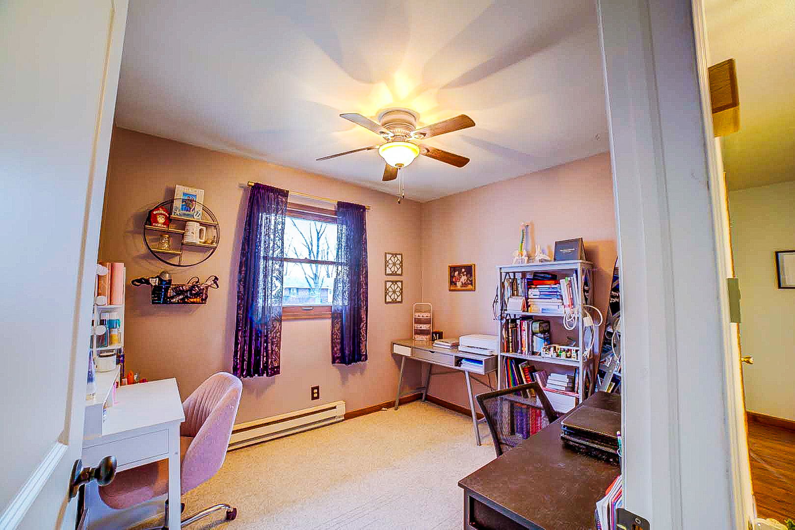 708 Sycamore Street Watseka, IL 60970 - Photo 25 of 25 a living room with furniture and a window