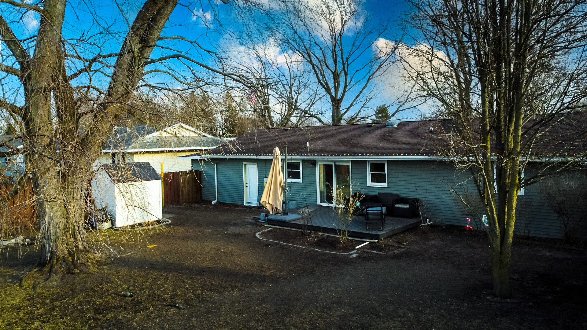 708 Sycamore Street Watseka, IL 60970 - Photo 4 of 25 a view of a chair and table in backyard of a house