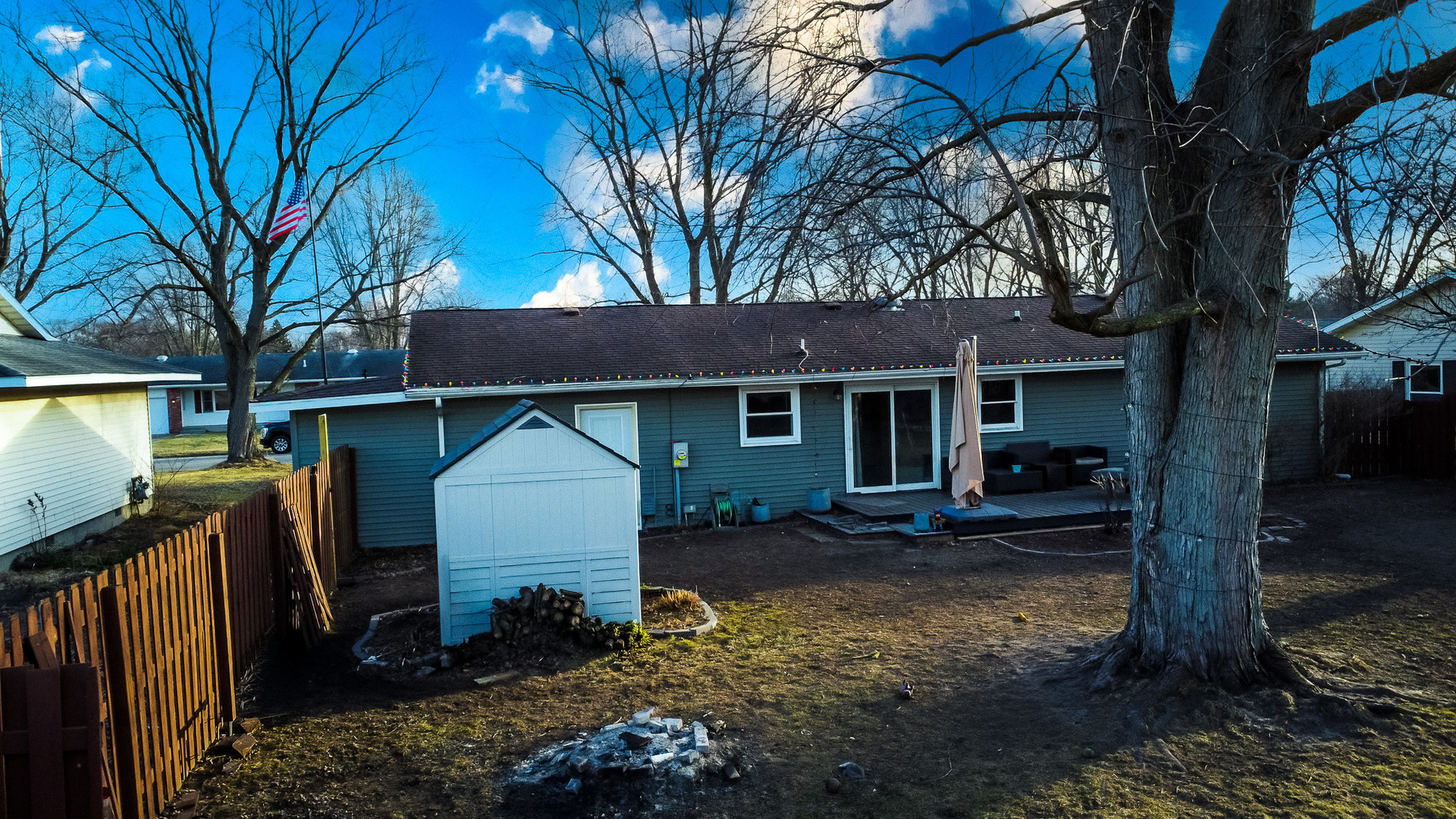 708 Sycamore Street Watseka, IL 60970 - Photo 6 of 25 a view of a house with backyard and furniture