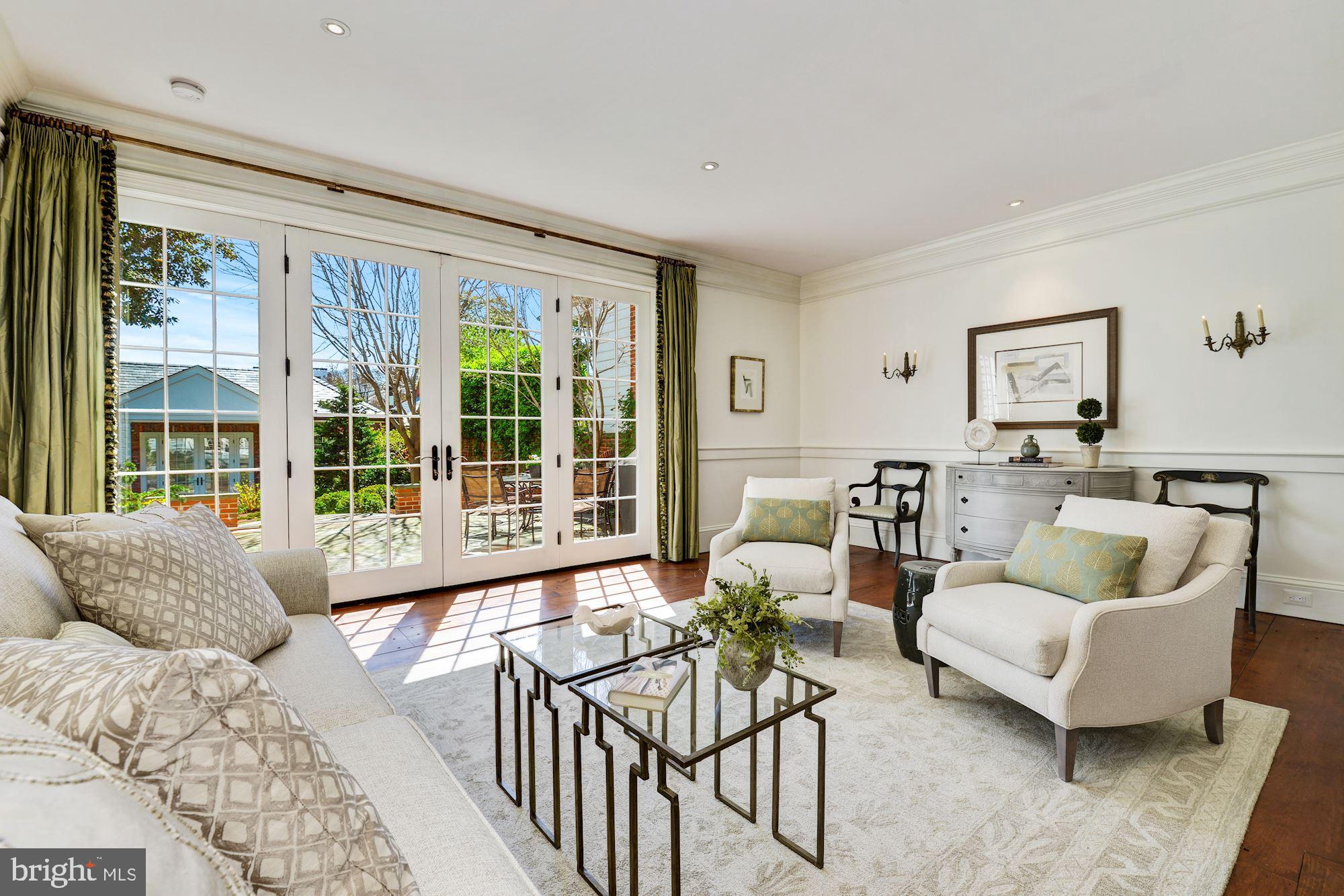 3330 Reservoir Road Northwest Washington, DC 20007 - Photo 4 of 25 SUNLIT LIVING ROOM W/ GARDEN VIEWS AND ACCESS