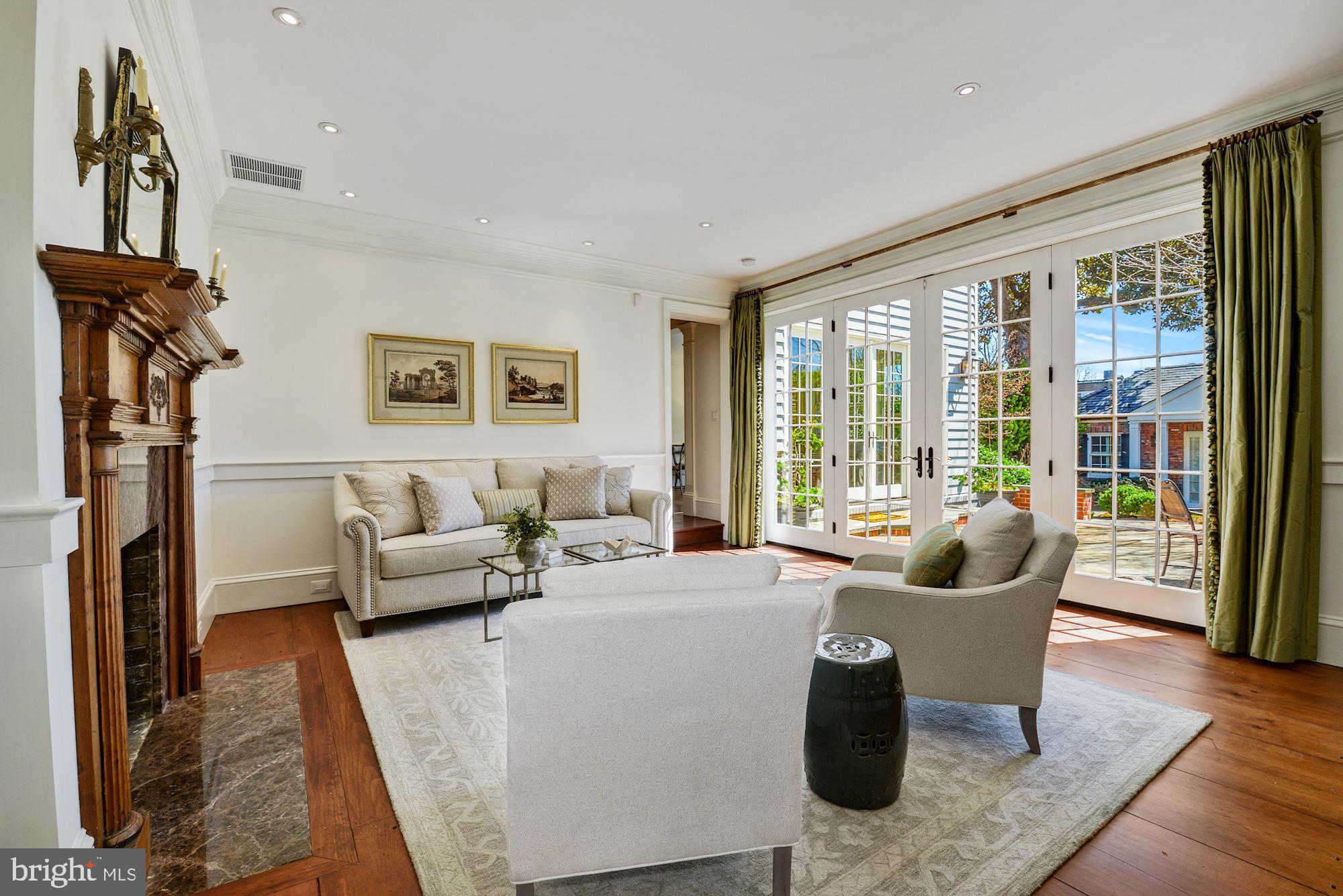3330 Reservoir Road Northwest Washington, DC 20007 - Photo 5 of 25 LIVING ROOM W/ FIREPLACE & RESTORED MANTLE