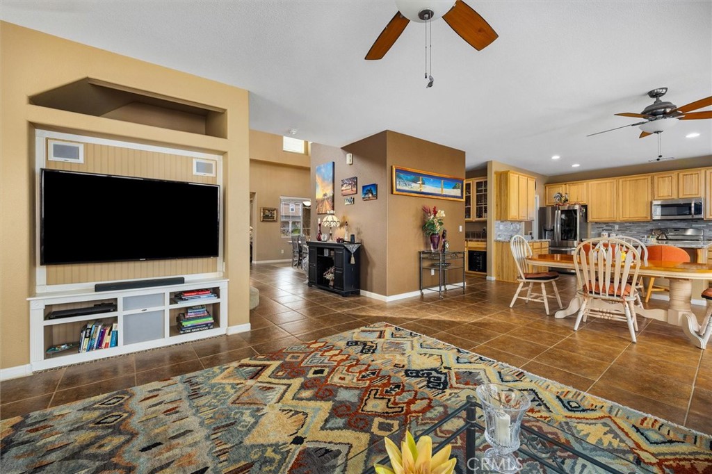 795 Angus Street Paso Robles, CA 93446 - Photo 14 of 75 a living room with furniture and a flat screen tv