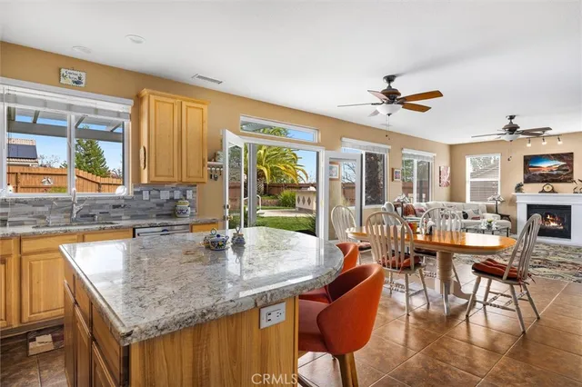 a view of a bedroom with furniture and windows