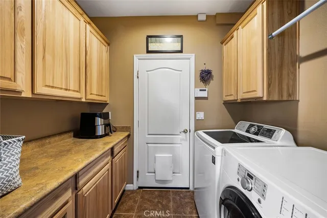 a spacious bathroom with a tub sink shower and mirror