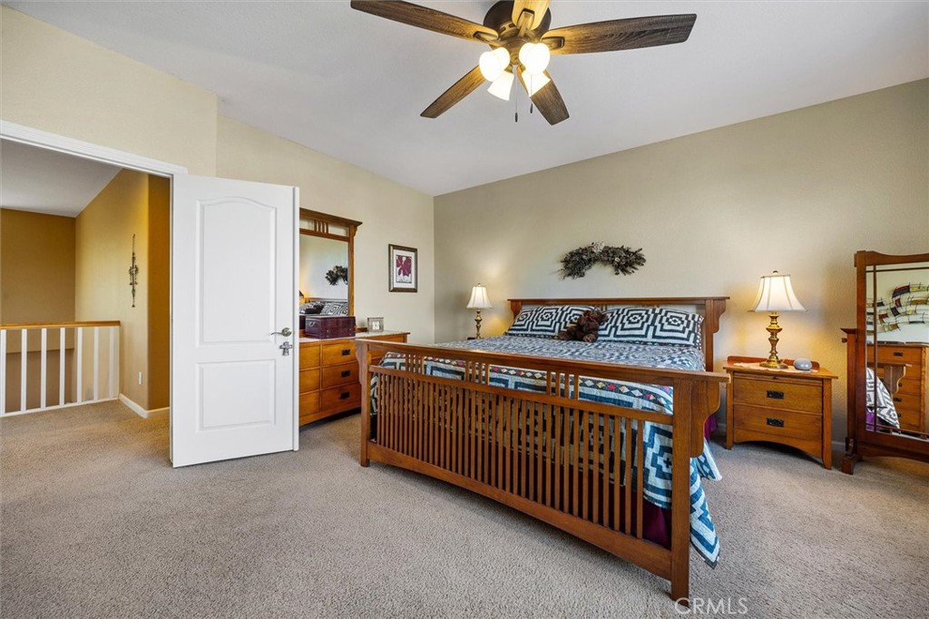 795 Angus Street Paso Robles, CA 93446 - Photo 26 of 75 a view of a bedroom with furniture and windows