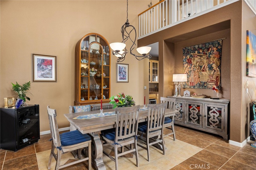 795 Angus Street Paso Robles, CA 93446 - Photo 3 of 75 a view of a dining room with furniture and chandelier