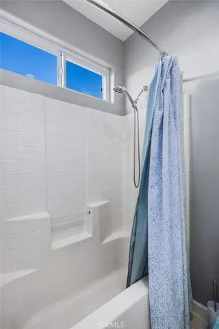 a view of a patio with swimming pool table and chairs