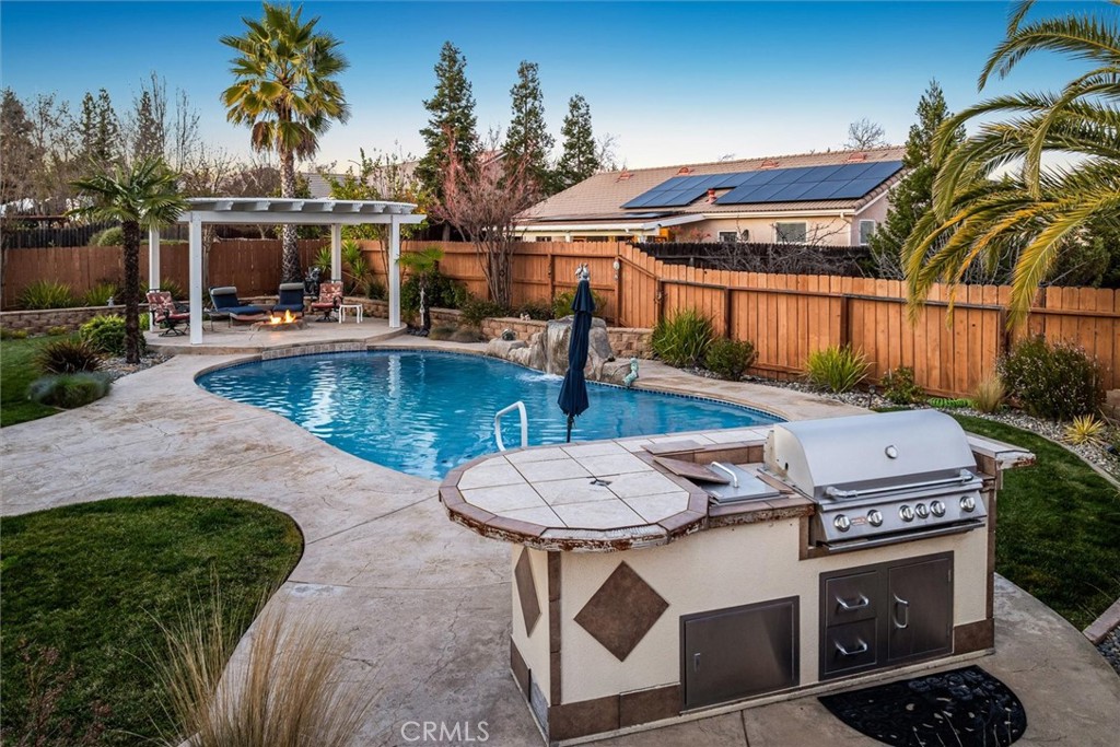 795 Angus Street Paso Robles, CA 93446 - Photo 62 of 75 a view of a swimming pool with a patio and a yard