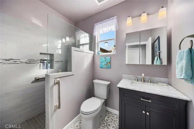 a living room with furniture fireplace and a flat screen tv