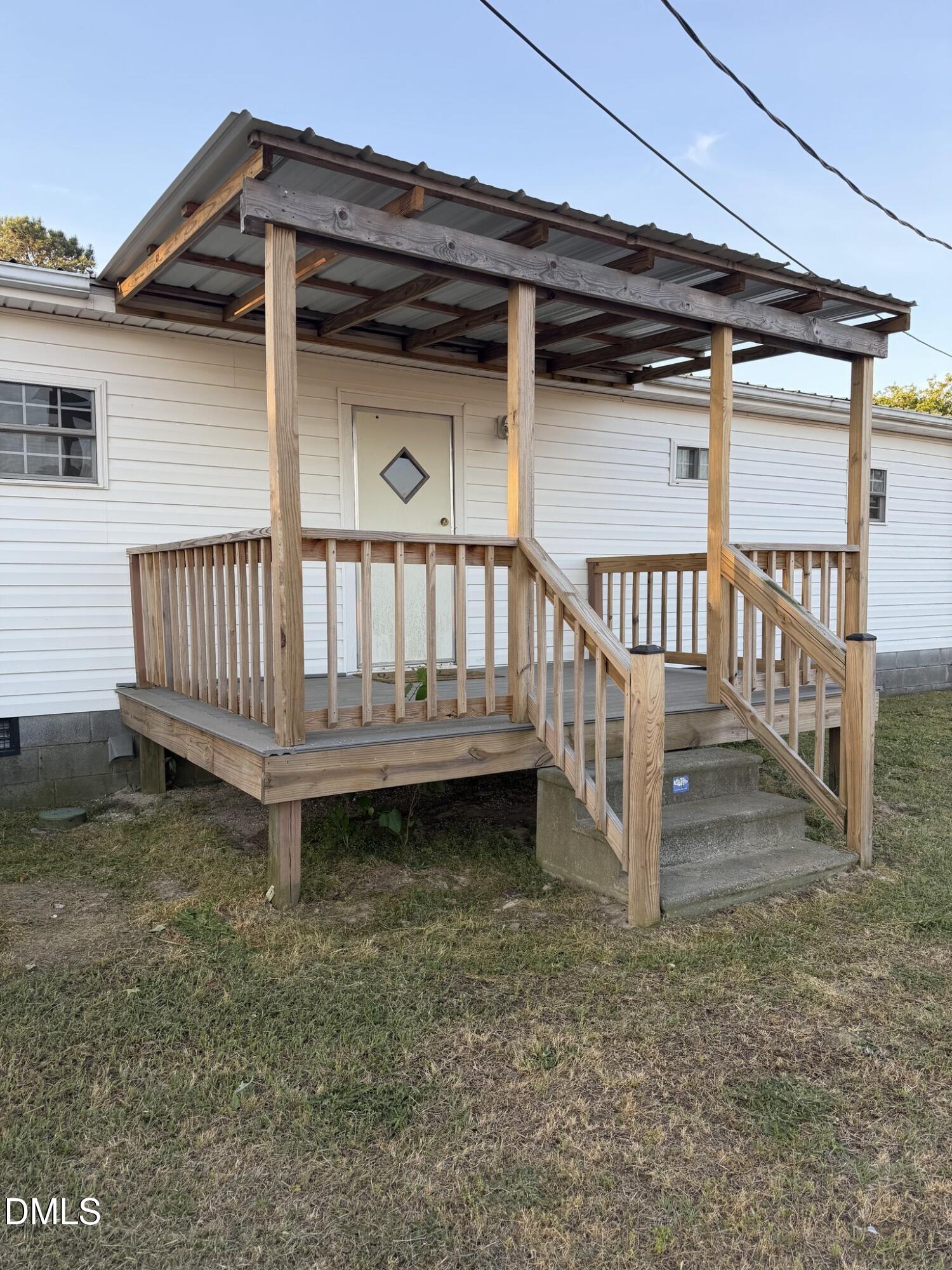 173 Lewis Iley Tew Road Dunn, NC 28334 - Photo 17 of 17 Covered rear deck