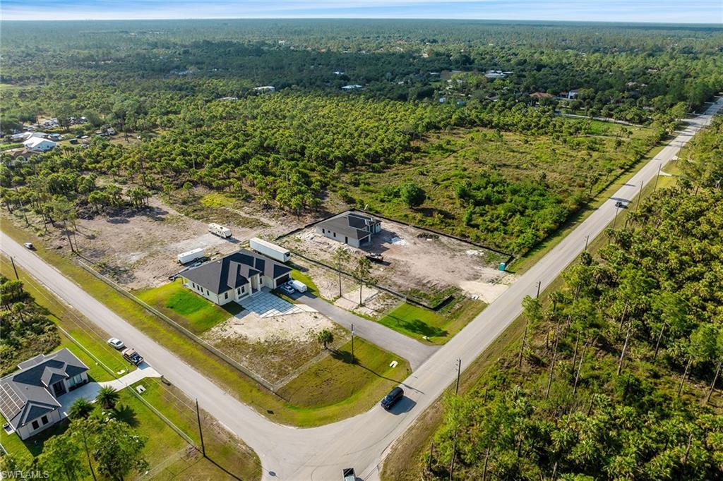 Everglades Boulevard South Naples, FL 34117 - Photo 12 of 13 a view of a yard with an outdoor seating