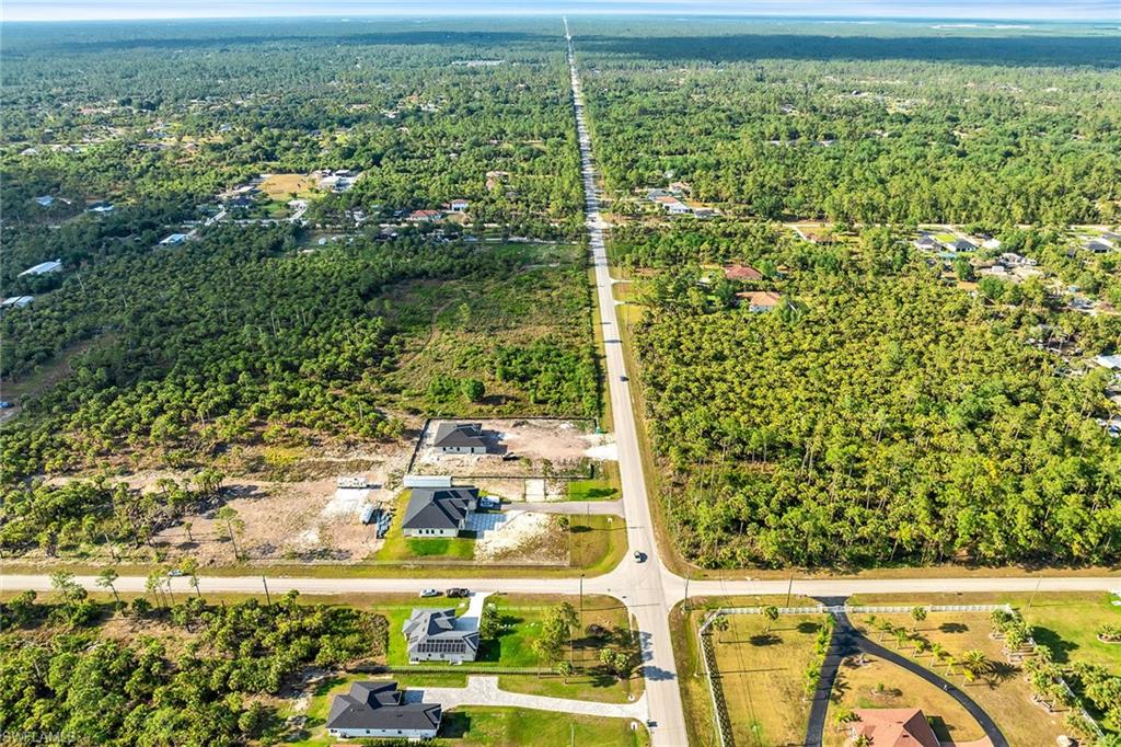 Everglades Boulevard South Naples, FL 34117 - Photo 13 of 13 a view of a balcony with an outdoor space