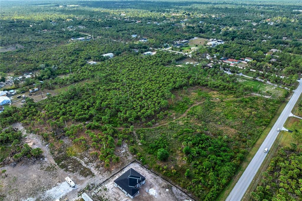 Everglades Boulevard South Naples, FL 34117 - Photo 2 of 13 an aerial view of residential house with outdoor space