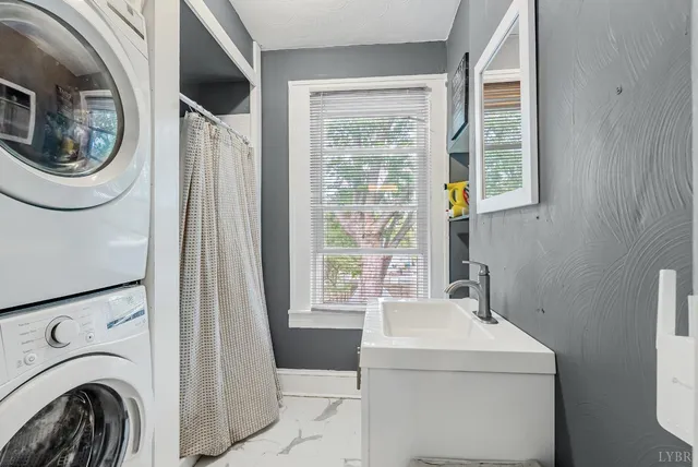 a utility room with dryer and washer