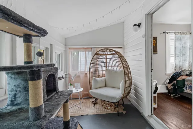 a living room with furniture and window