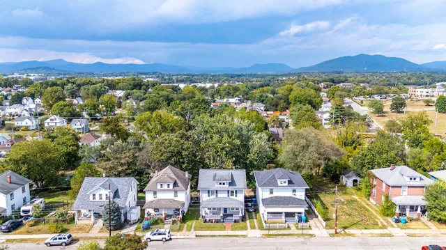 a view of a city with a lake