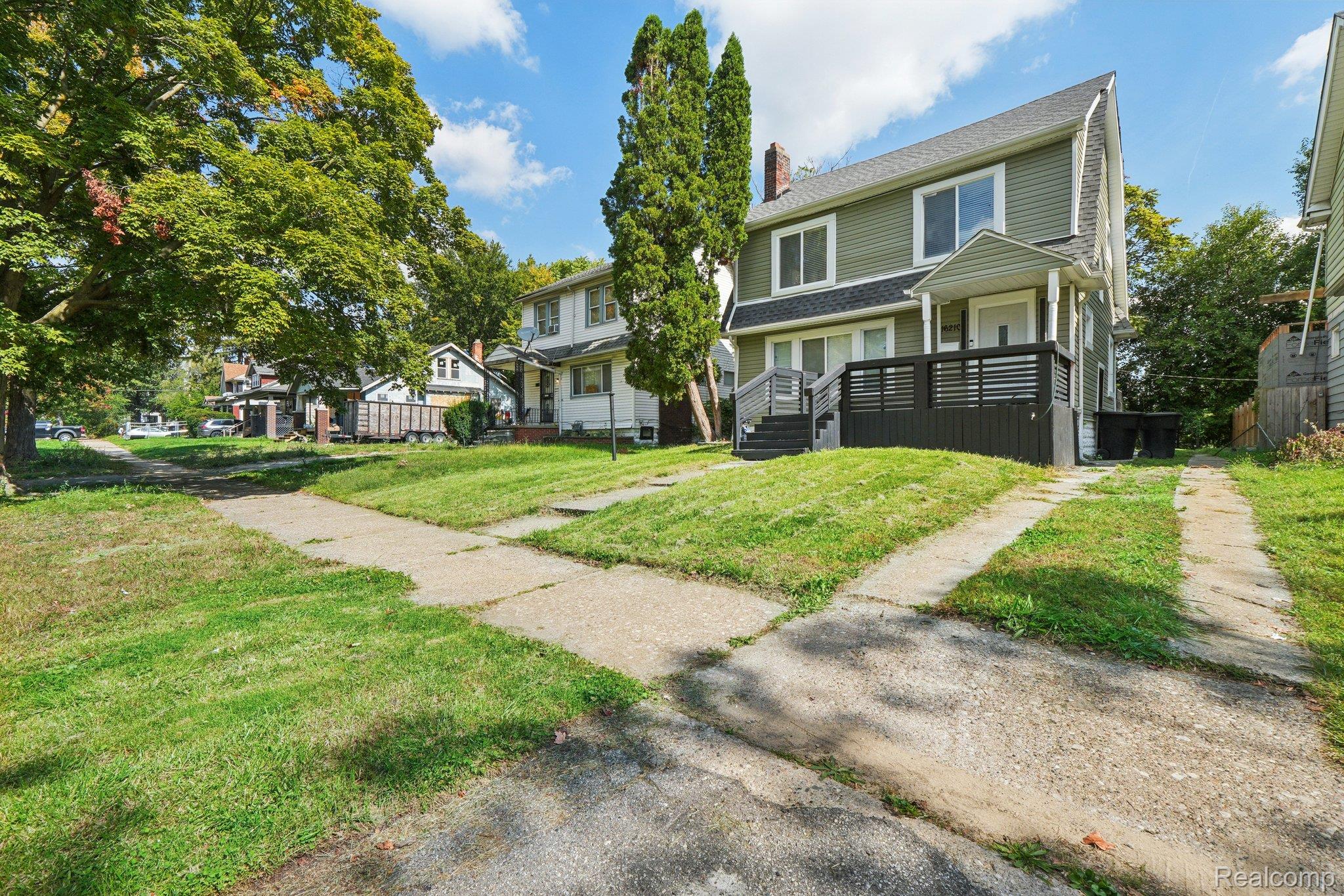 16210 Inverness Street Detroit, MI 48221 - Photo 2 of 29 Two-story exterior featuring a gabled roof and siding