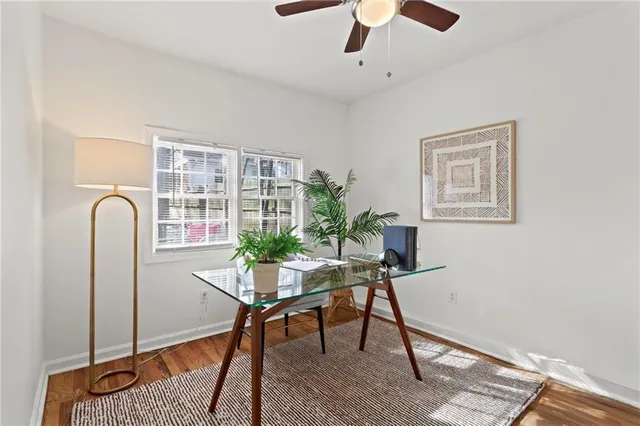 a workspace with furniture and window