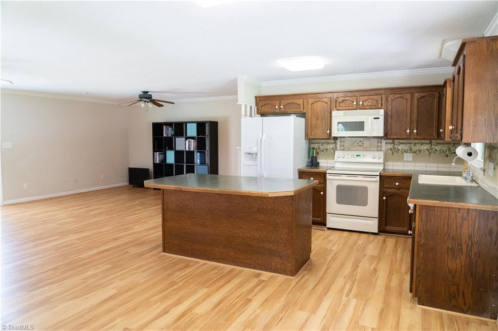 5904 Drake Road Greensboro, NC 27406 - Photo 7 of 17 Open Concept Kitchen and Living Space