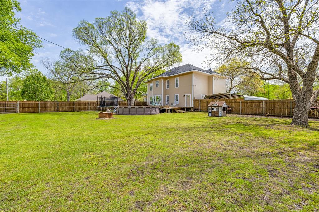 901 North Main Street Leonard, TX 75452 - Photo 25 of 25 a view of a house with a yard