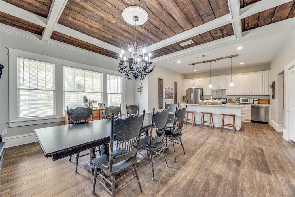 901 North Main Street Leonard, TX 75452 - Photo 7 of 25 a view of a dining room with furniture window and wooden floor