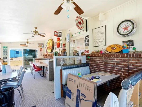a view of dinning table and chairs in patio