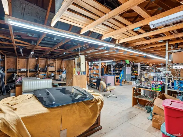 a view of a room with furniture and toys