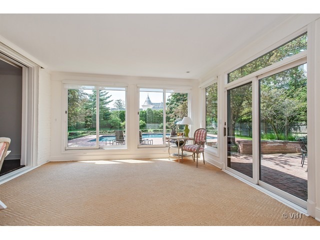 76 Locust Road Winnetka, IL 60093 - Photo 17 of 25 a living room with furniture and windows
