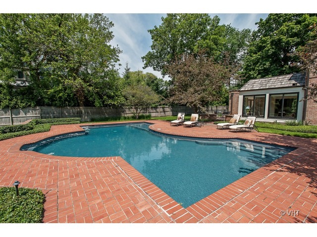76 Locust Road Winnetka, IL 60093 - Photo 20 of 25 swimming pool view with a seating space