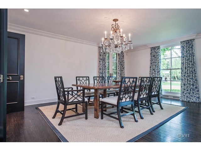 76 Locust Road Winnetka, IL 60093 - Photo 8 of 25 a view of a dining room with furniture window and wooden floor