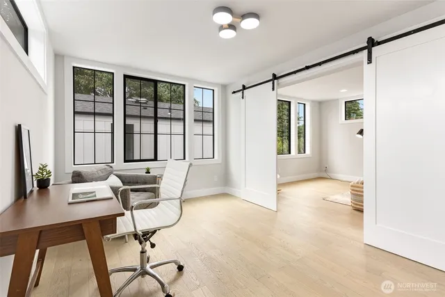 a workspace with furniture and window