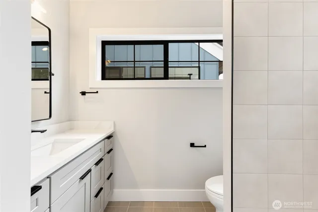 a bathroom with a sink and a toilet
