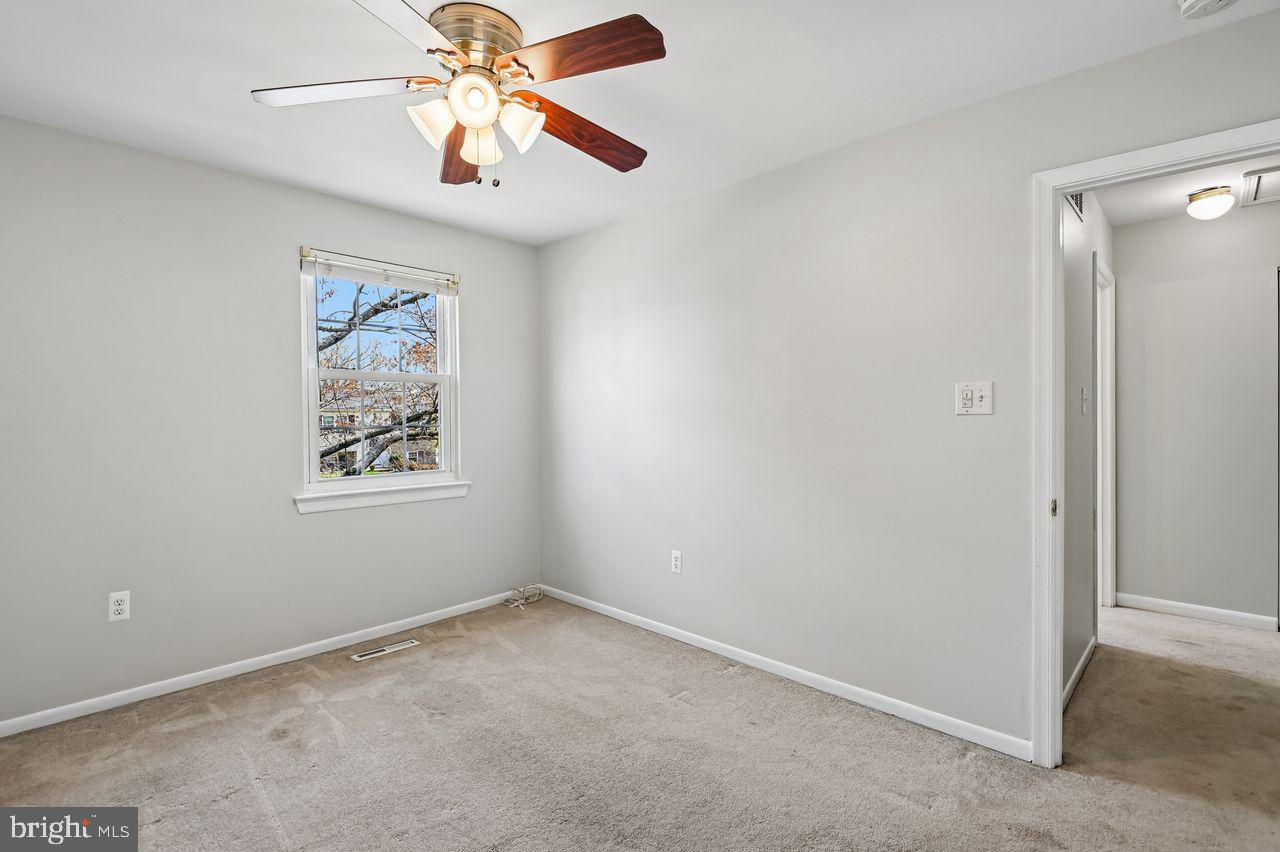 746 Match Point Drive Arnold, MD 21012 - Photo 26 of 52 an empty room with windows and fan