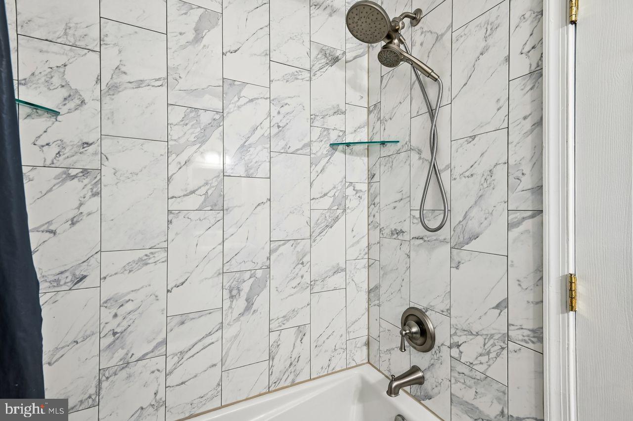 746 Match Point Drive Arnold, MD 21012 - Photo 31 of 52 a bathroom with a shower