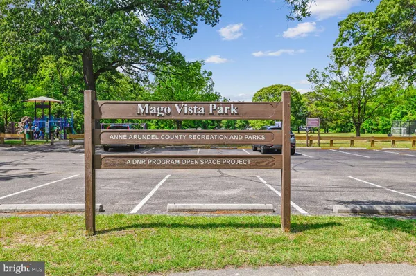 a view of a swimming pool and an outdoor space