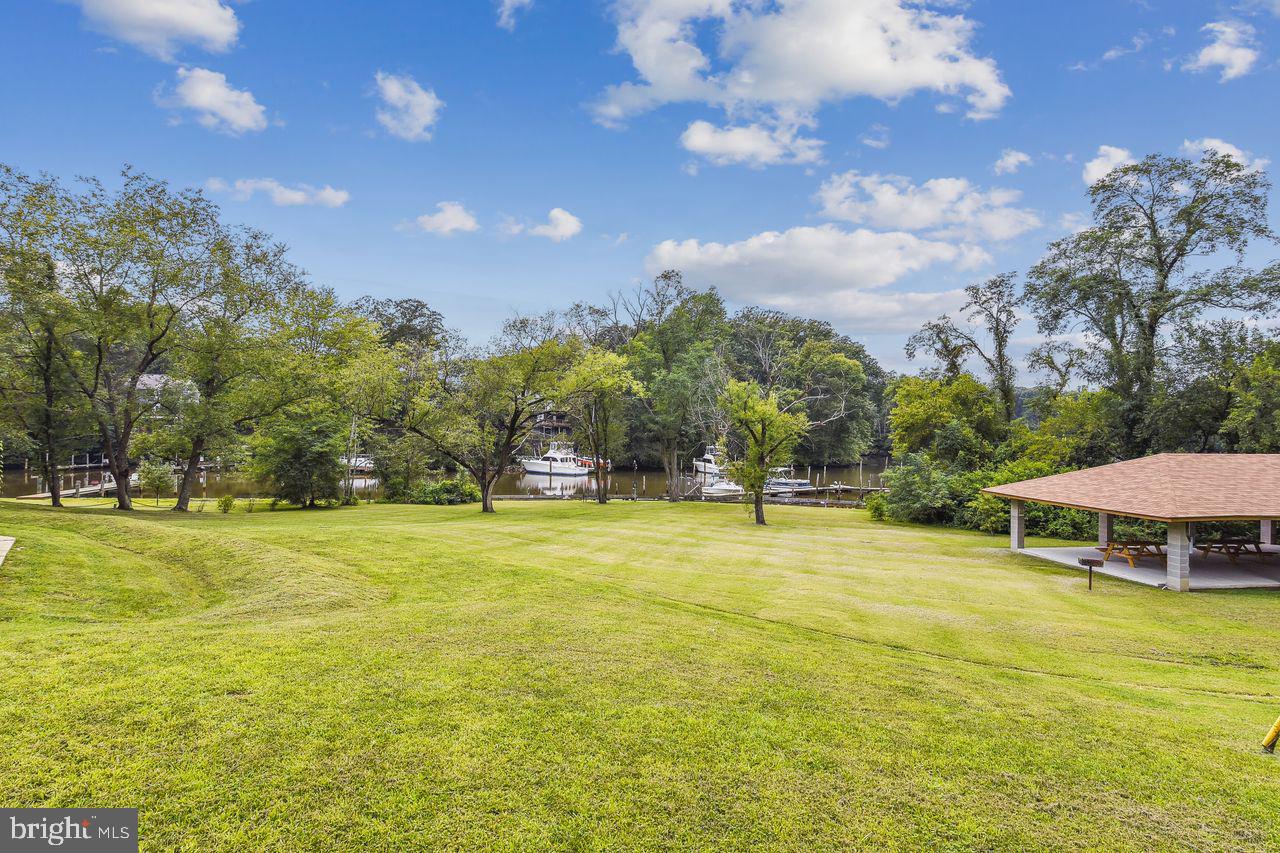 746 Match Point Drive Arnold, MD 21012 - Photo 46 of 52 a view of a swimming pool and an outdoor space