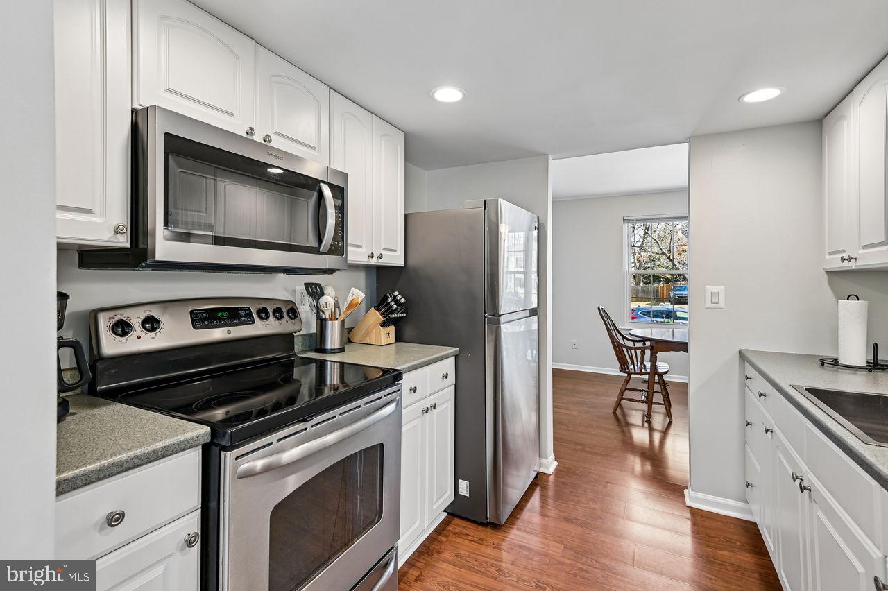 746 Match Point Drive Arnold, MD 21012 - Photo 10 of 52 a kitchen with a stove microwave and refrigerator