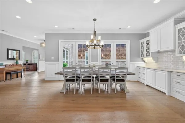 a bedroom with a bed and a cabinets