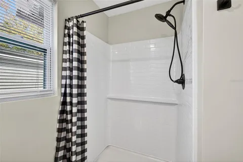 a view of a hallway with washer and dryer